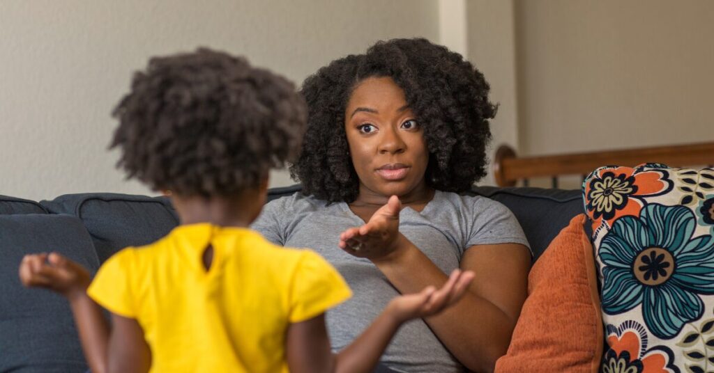 mother reaching out to child who is having a struggle with emotions